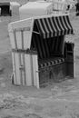 Grayscale Photo of Stack of White Plastic Crates