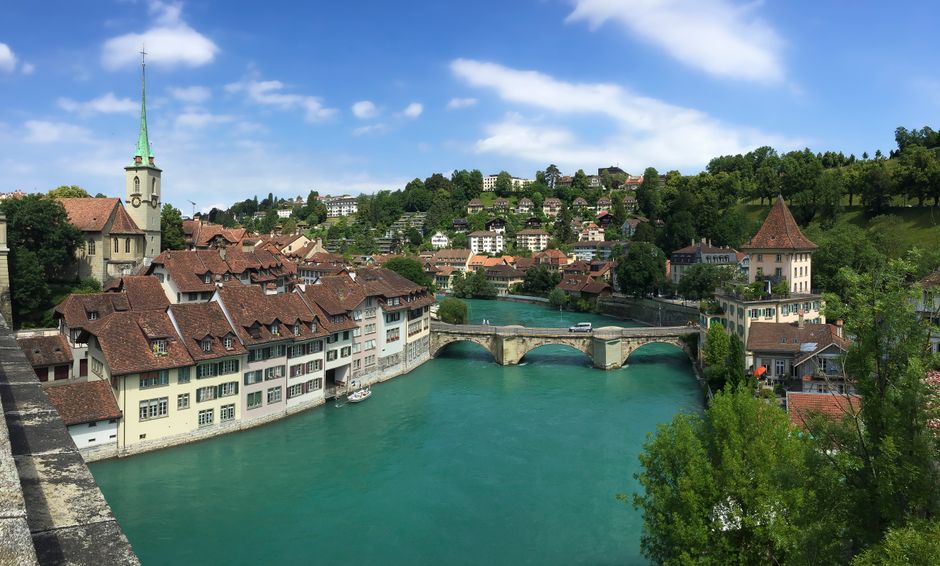 Beautiful aerial view capturing Bern's scenic old town and river in summer.