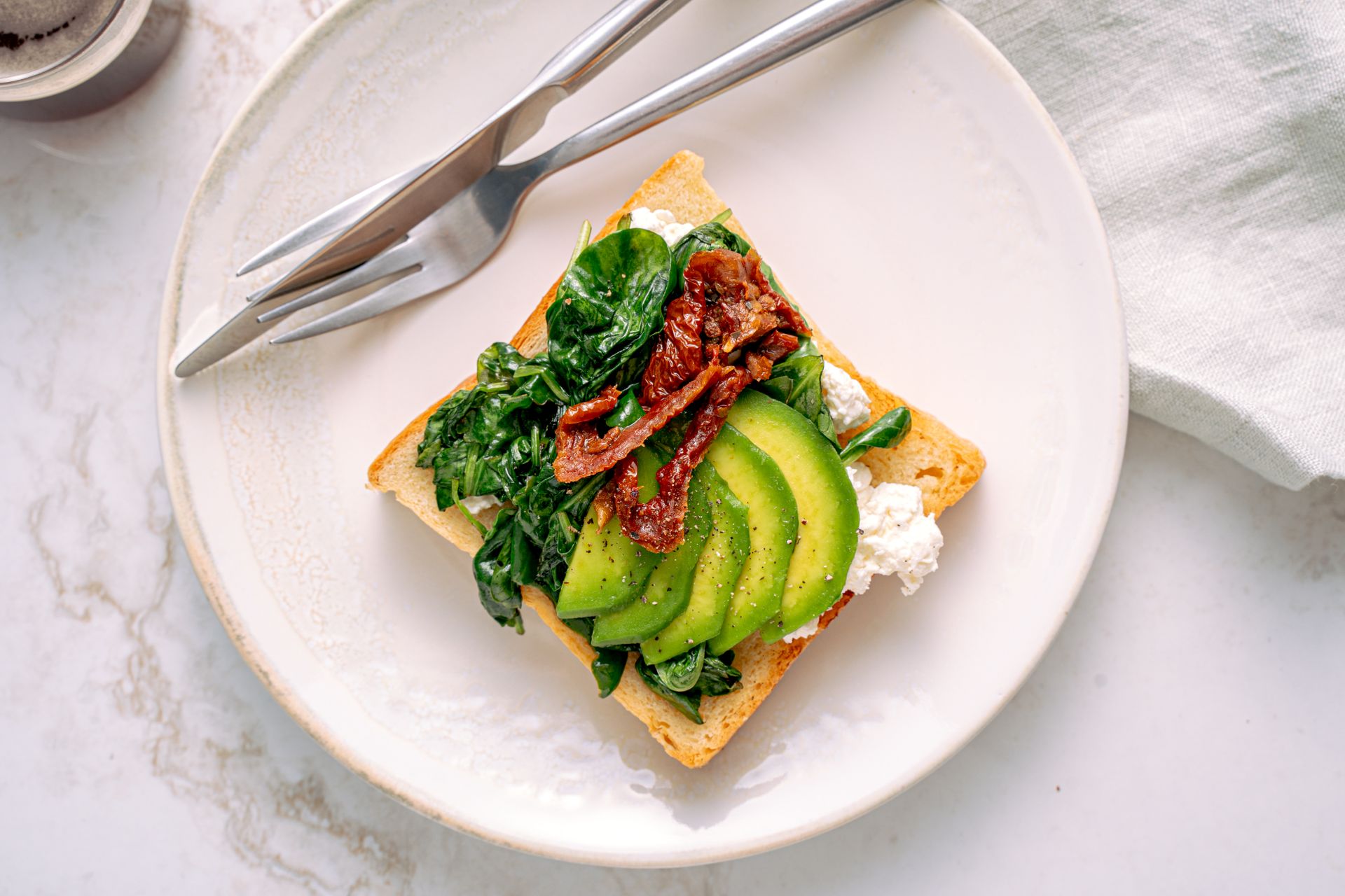 Delicious Avocado Toast on White Ceramic Plate