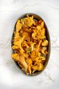 Chanterelle Mushrooms in Stainless Steel Flan Mold
