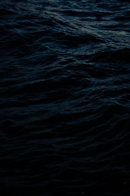 Dark and moody ocean waves photographed at Bronte Beach, Australia.