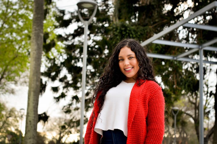 Smiling Girl With Braces Posing Outdoors