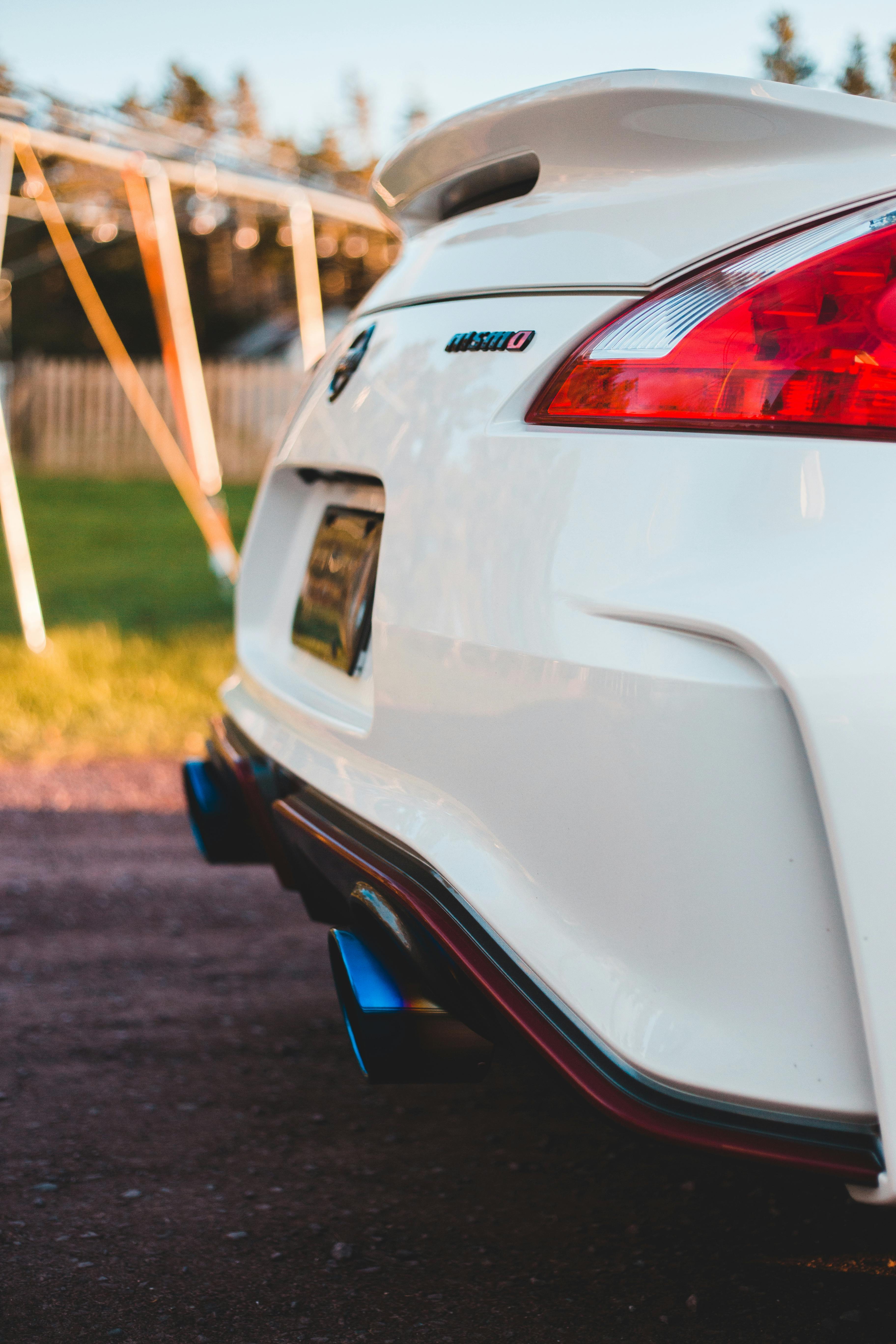 trunk of modern sport car parked on road