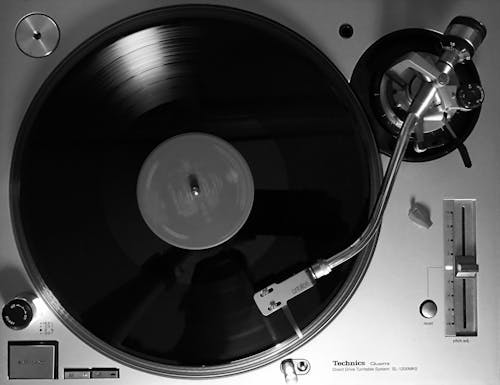 Monochrome Photo of Black Vinyl Record