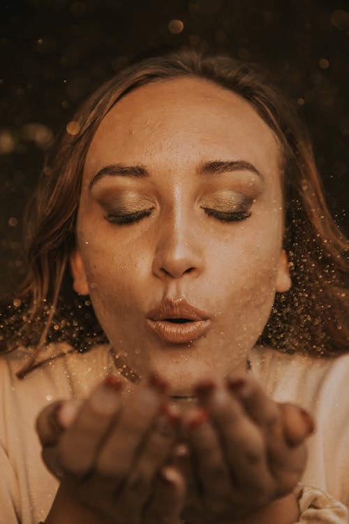 Woman in White Shirt With Brown Eyes