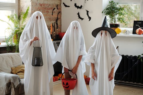 Free People in Ghost Costumes Stock Photo
