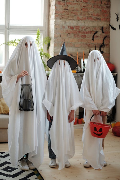 People in Ghost Costumes