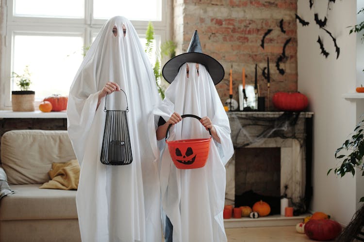 People In Ghost Costumes