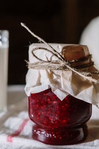 Homemade raspberry jam in a glass jar — photo by cottonbro studio on Pexels