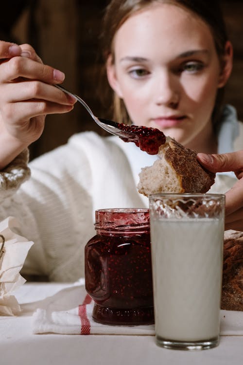 A Woman Eating Breakfast