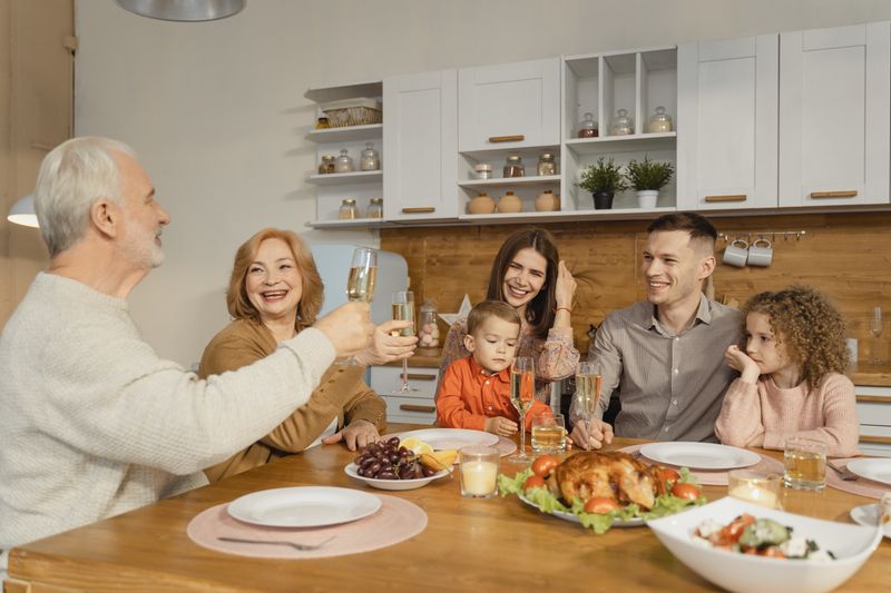 Family gathering together at home