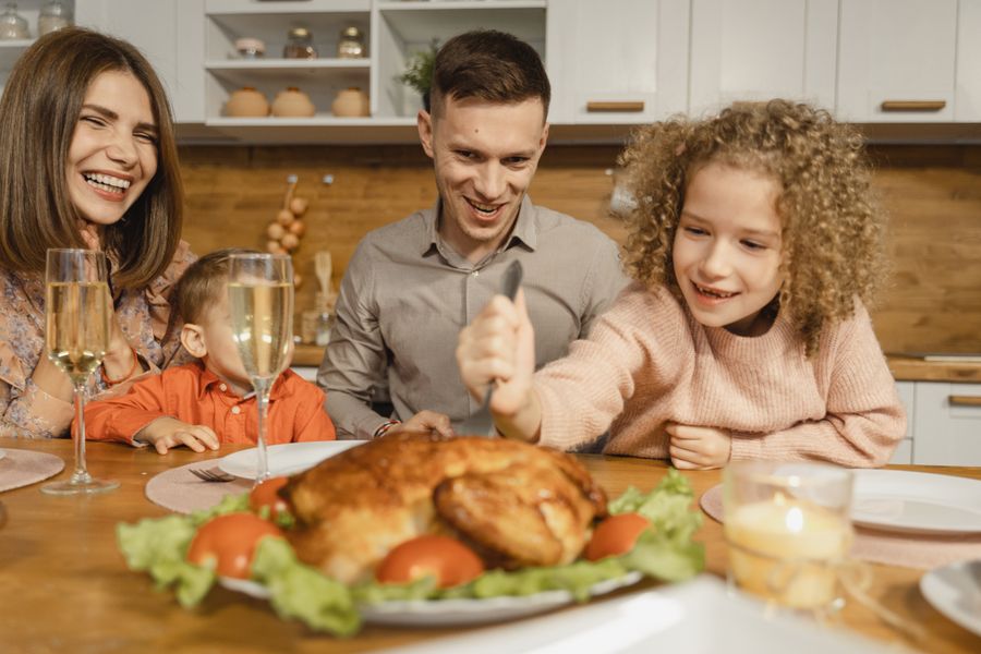 Family sharing a Thanksgiving meal