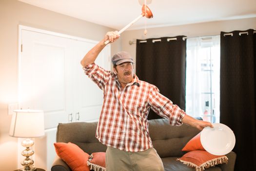 A Man with a Plunger and a Plate