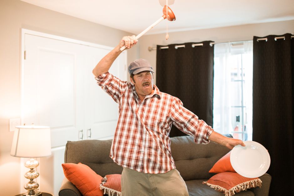homeowner using a plunger homeowner using a plunger