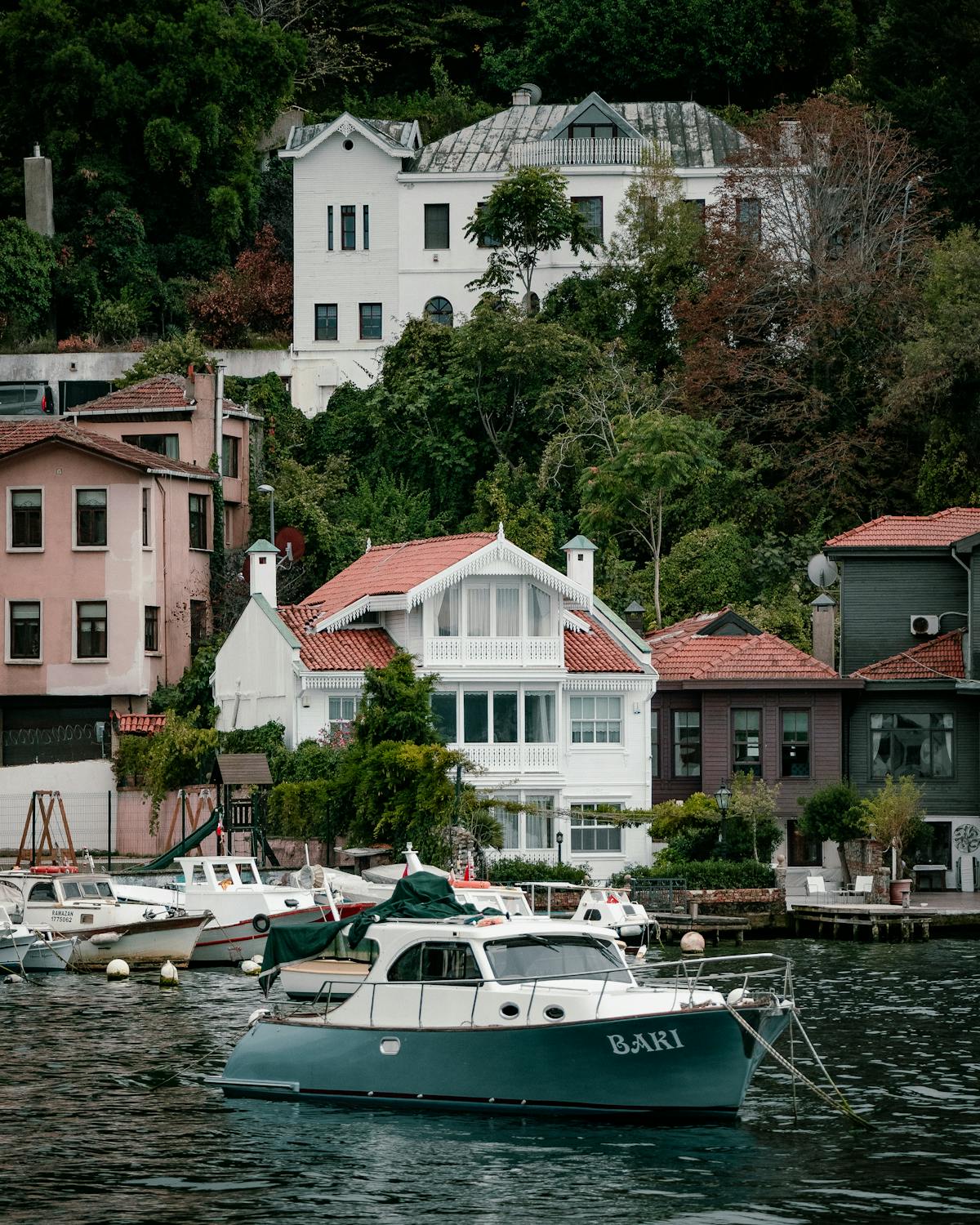 Calm organized bedroom with a chair and natural light