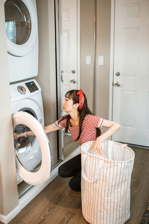 Free A Woman Doing Laundry Stock Photo