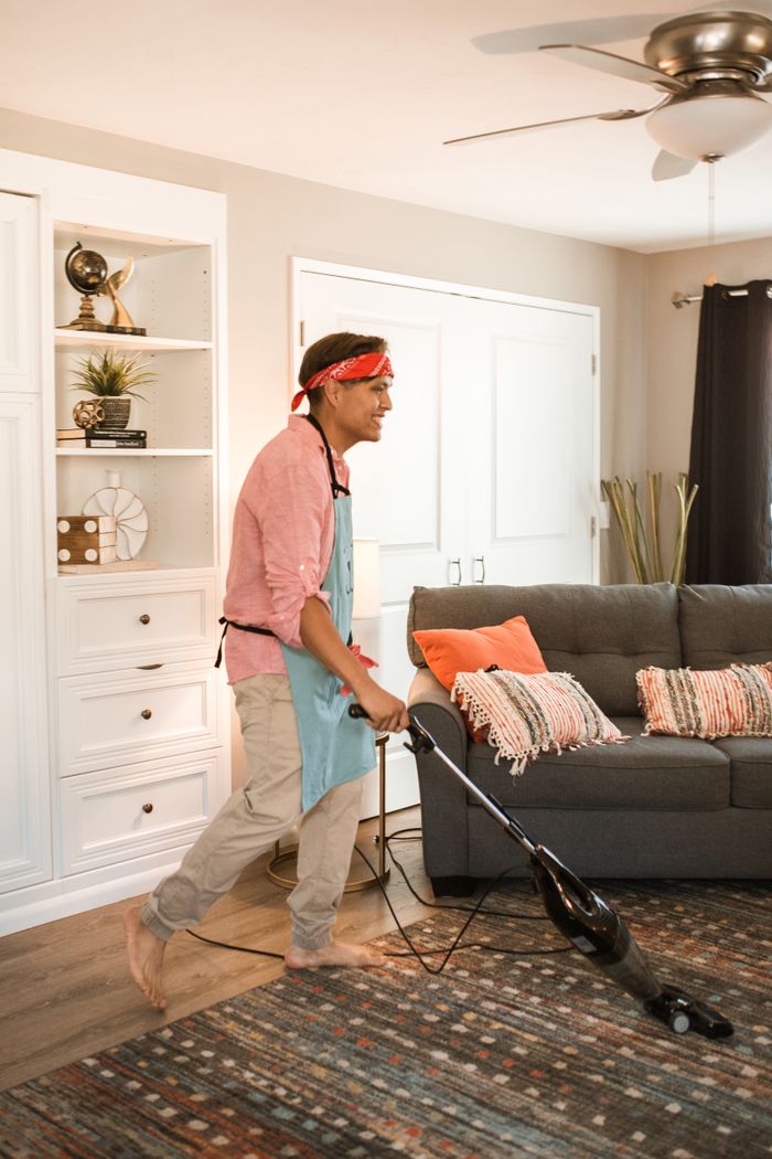 Cleaner vacuuming living room in Reading