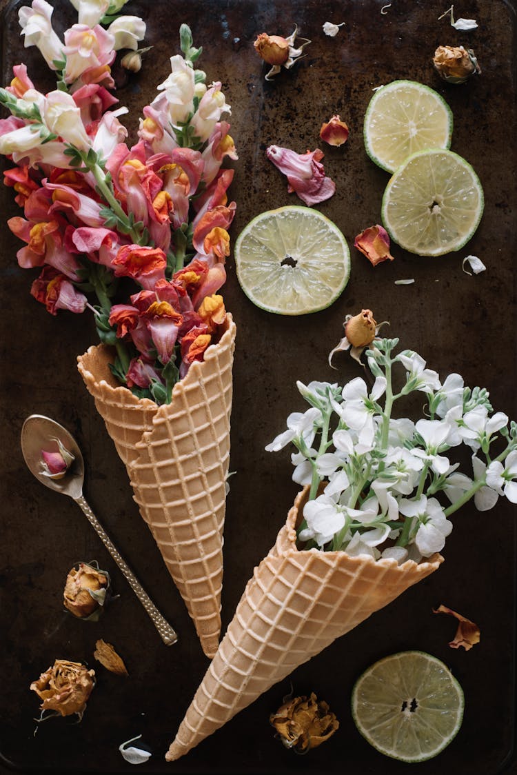 Fresh Flowers In Waffle Cones Near Lemon