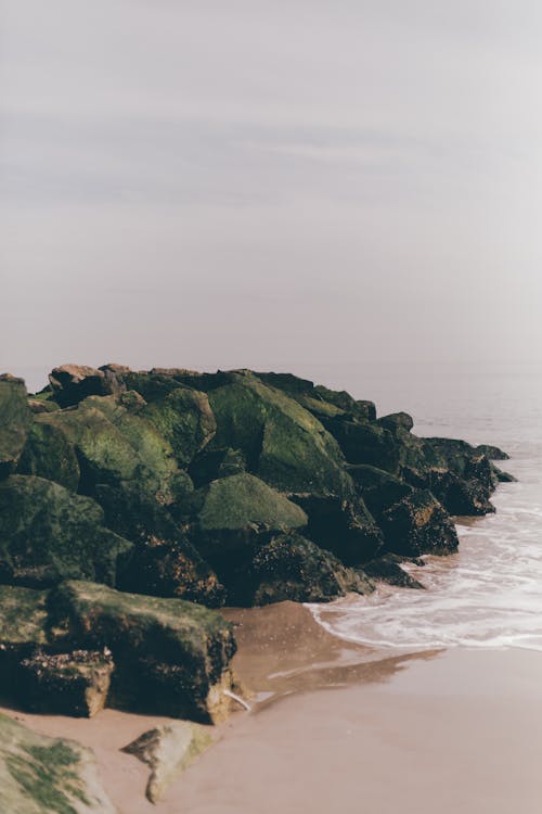 Rocky formation near calm sea water