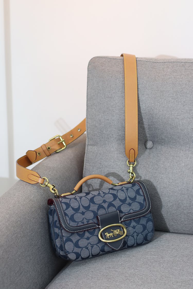 Luxury Handbag On Armchair