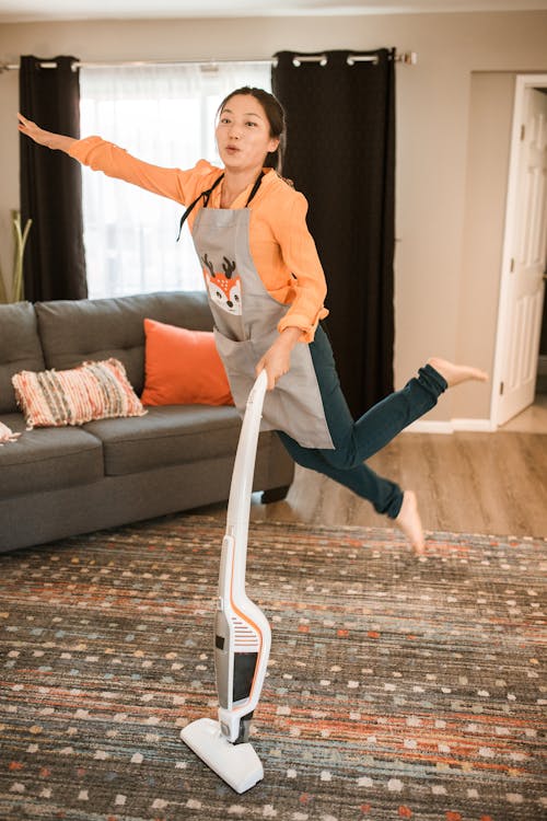 Vacuuming the carpet