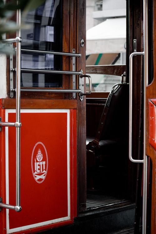 Free Capture of a classic Istanbul tram's open door showing intricate details and vibrant colors. Stock Photo