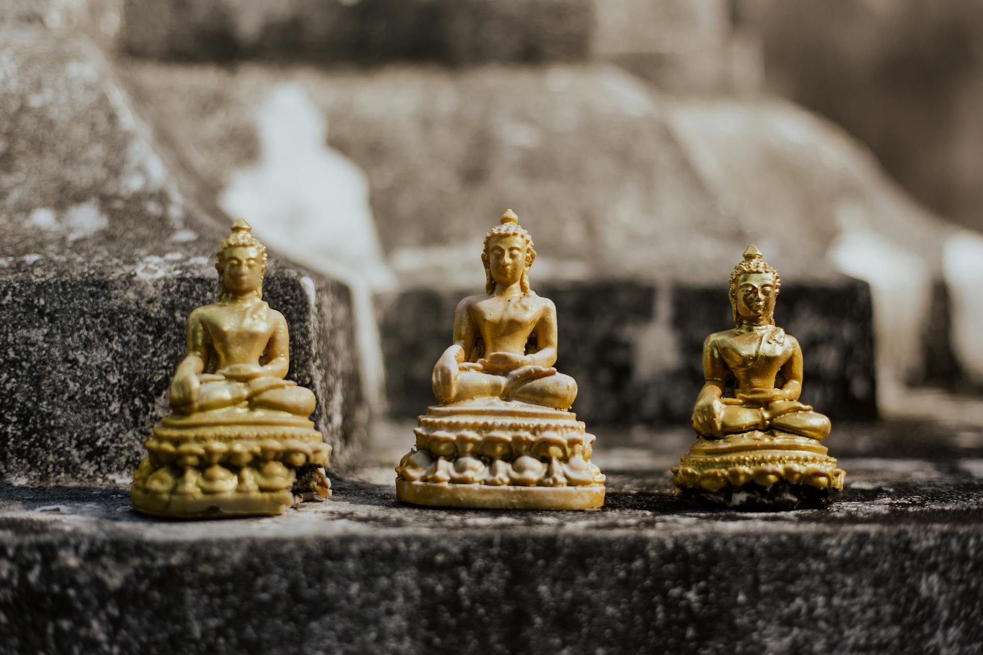 Golden Buddha Statue Figurines Close-Up Photo