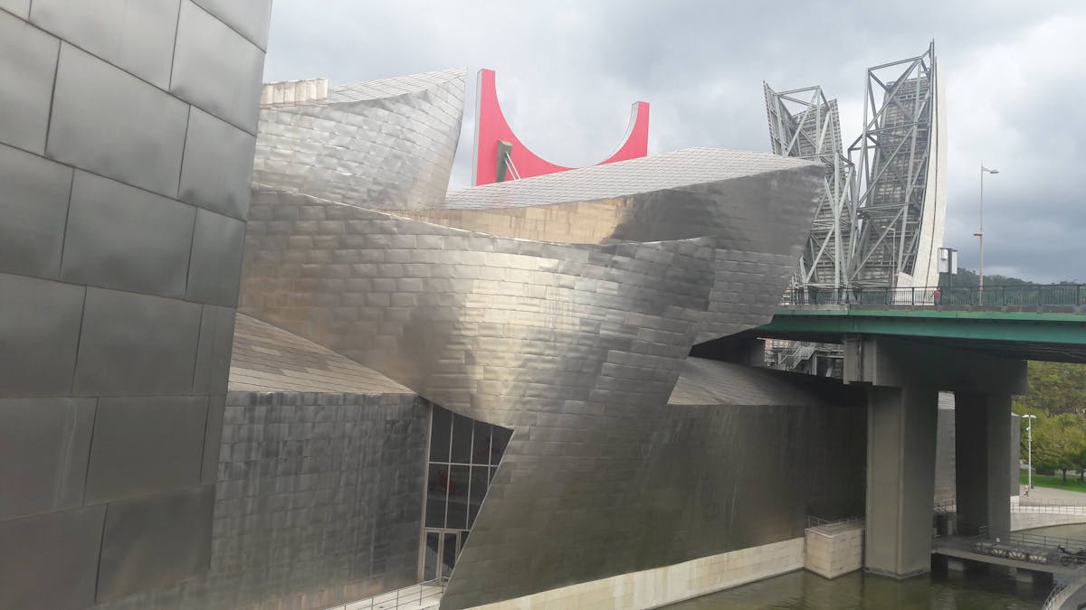Person laying on couch looking extremely tired