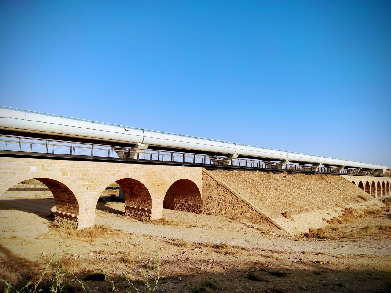 a scenic view of the historic railway bridge in be er sheva captured a