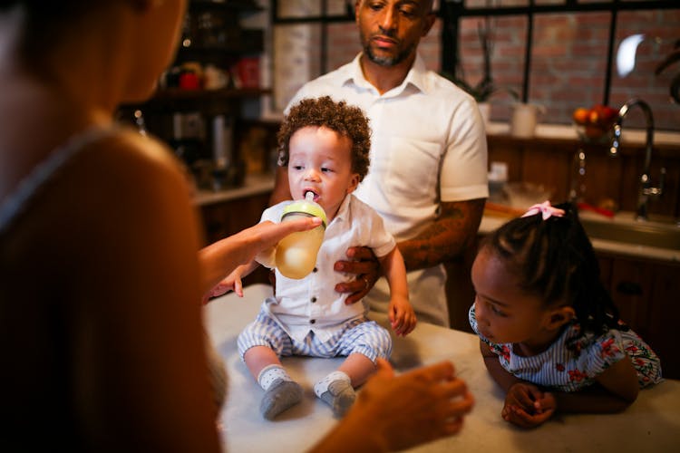 A Happy Family In The Kitchen