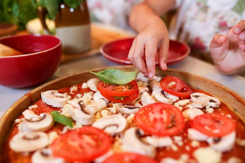 Little Girl Preparing Homemade Pizza 