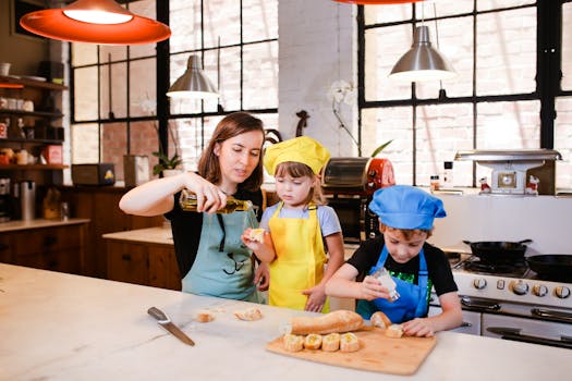 A mother and two children enjoy cooking together in a modern kitchen, creating happy family moments.