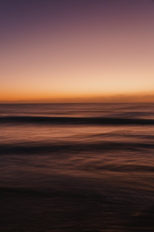 alacakaranlık gökyüzü, deniz, deniz manzarası içeren Ücretsiz stok fotoğraf