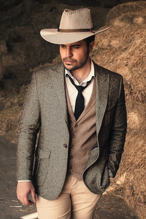 Man in Gray Suit With Brown Cowboy Hat