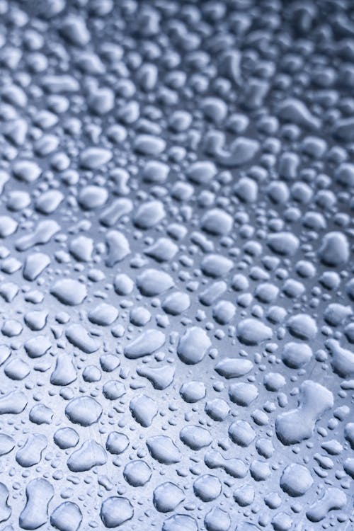 Free Water Droplets on Glass Surface Stock Photo