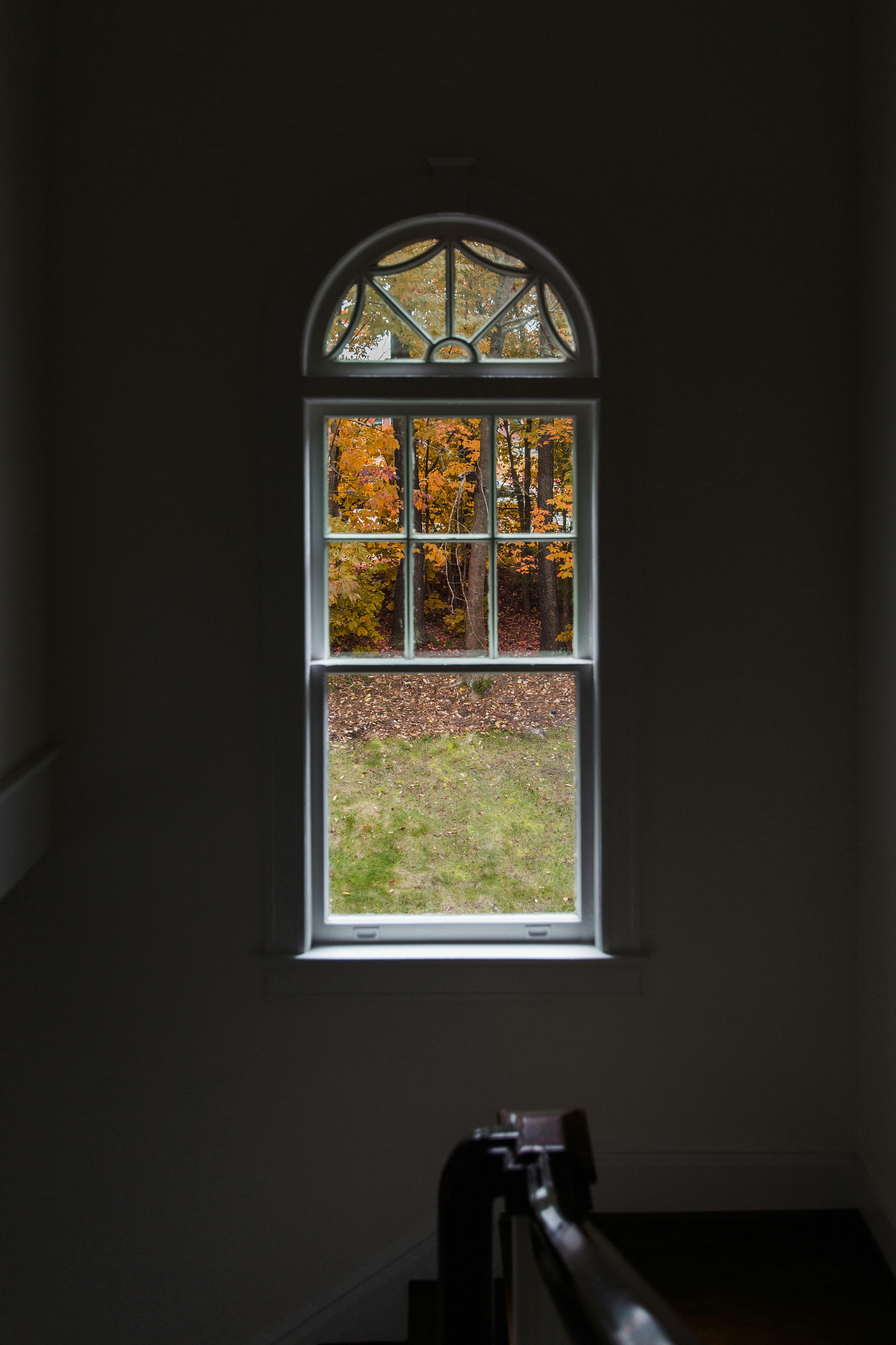 white wooden framed glass window