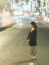 Woman on Street at Night