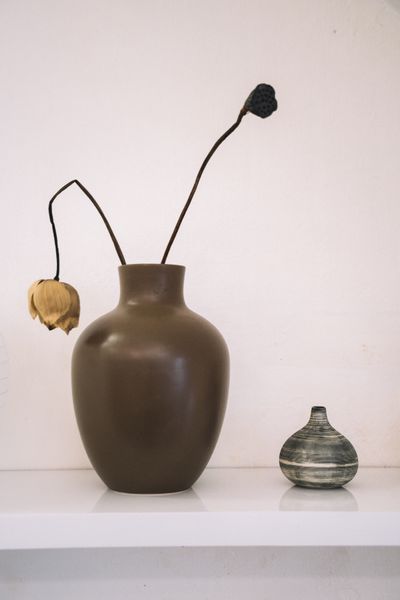 Two ceramic vases on a white shelf by Anna Tarazevich on Pexels