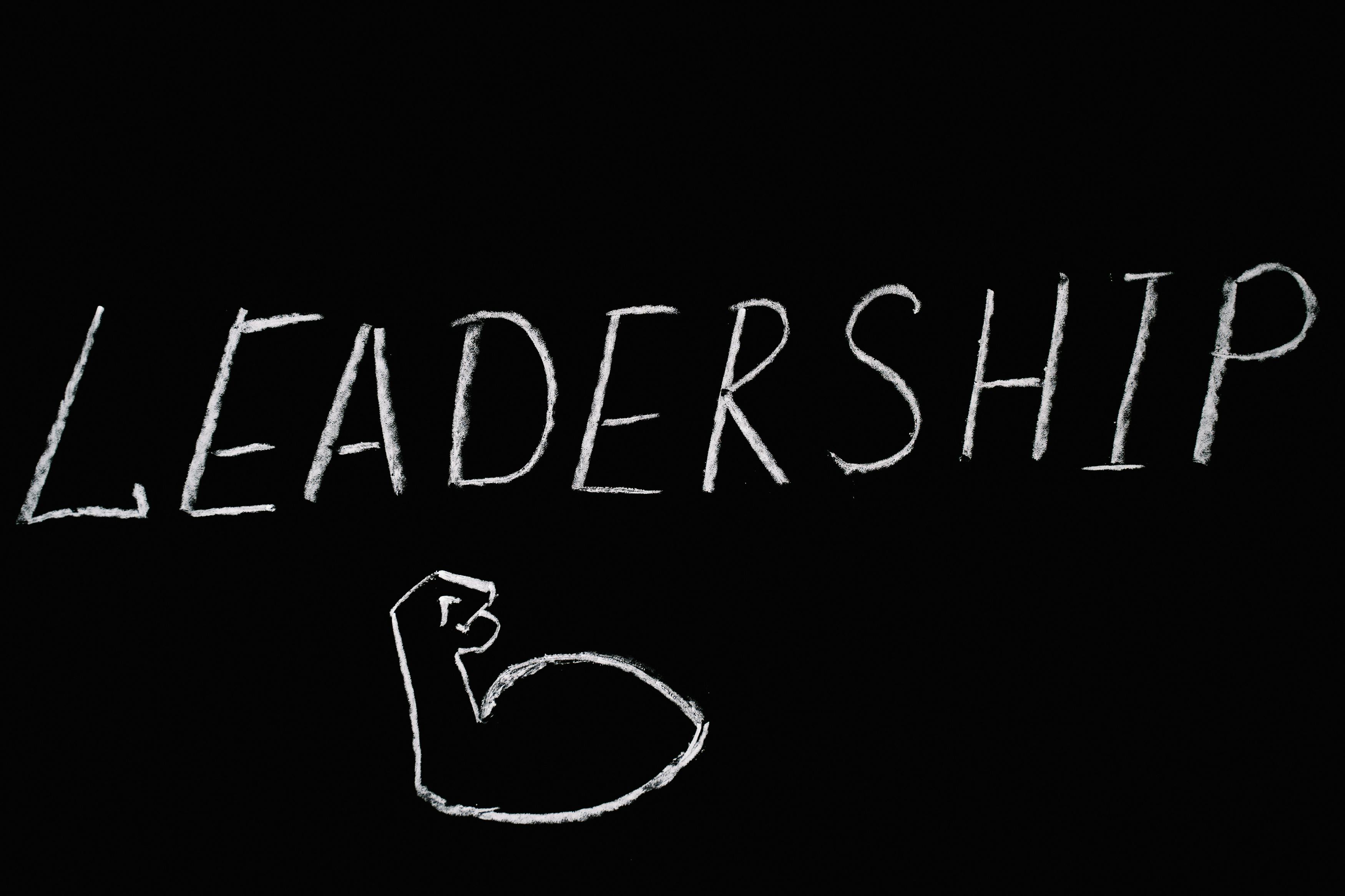 leadership lettering text on black background