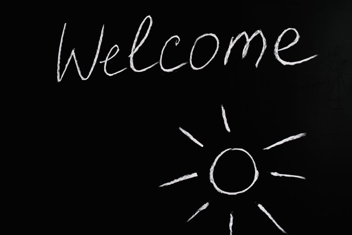Free Welcome Lettering Text on Black Background Stock Photo