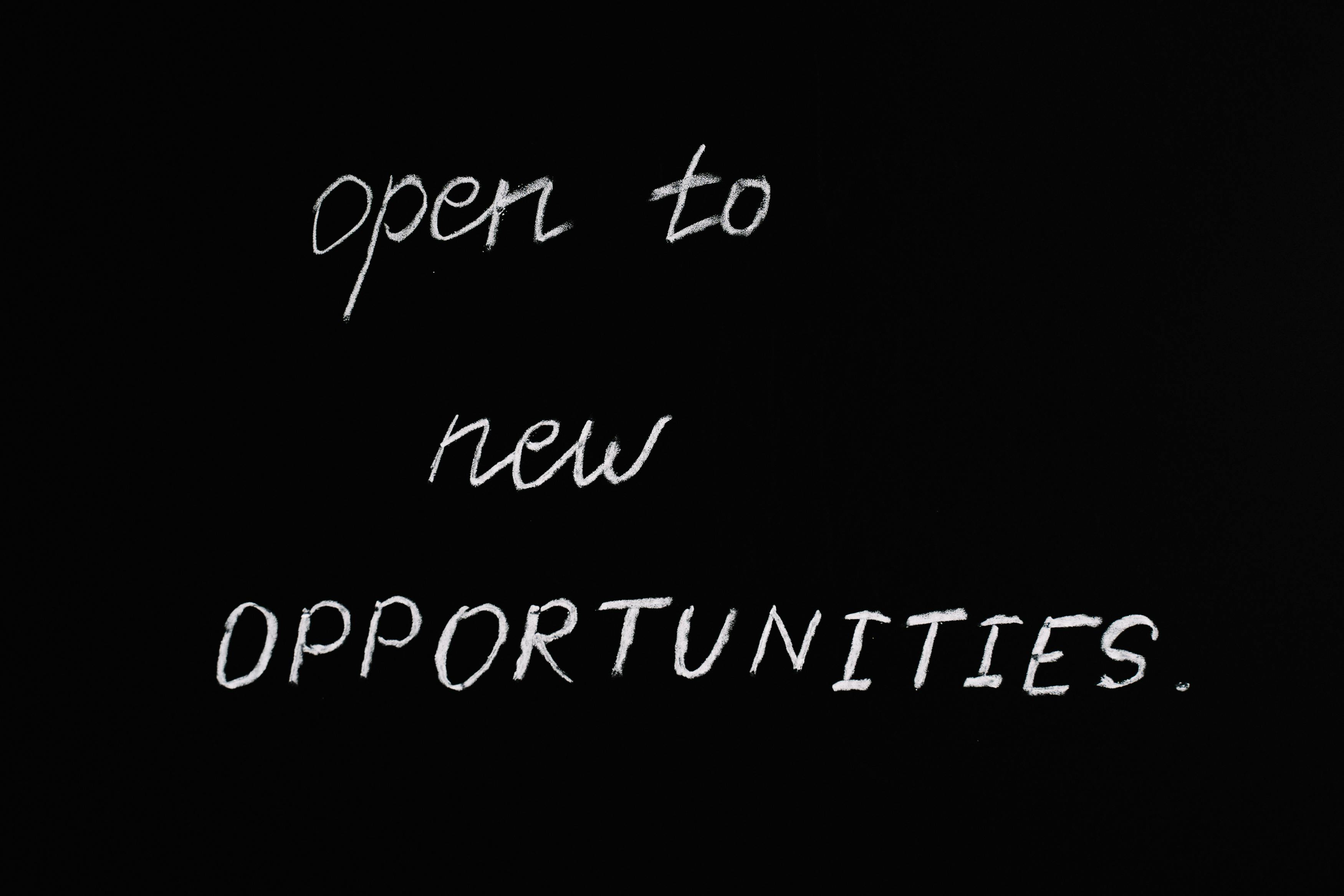 open to new opportunities lettering text on black background