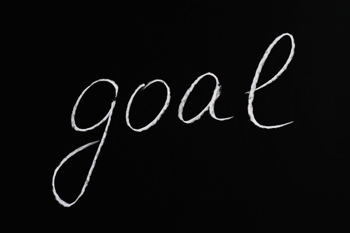 Free Goal Lettering Text on Black Background Stock Photo