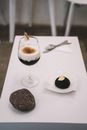 White and Black Cake on White Ceramic Plate