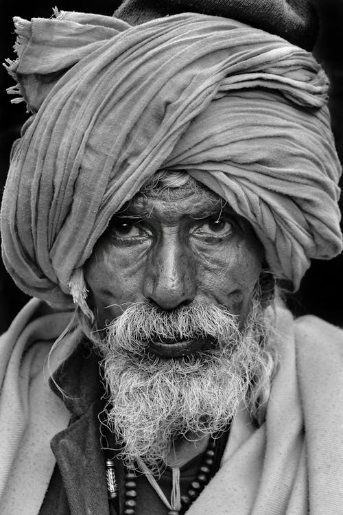 Grayscale Photo of Man Wearing Turban