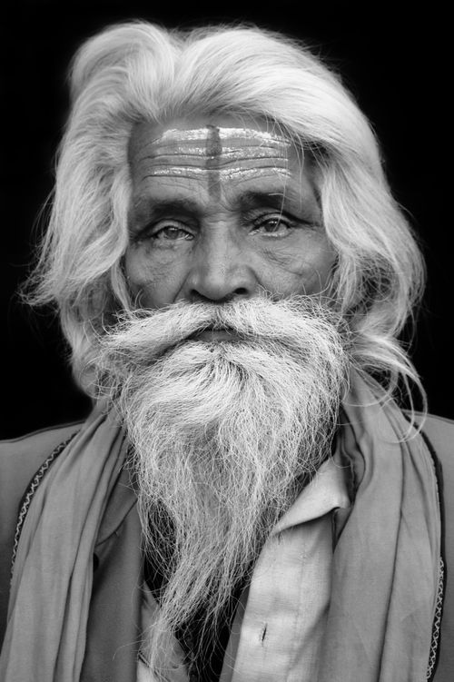 Free Black and white portrait of a wise senior man with a long white beard in Kolkata, India. Stock Photo