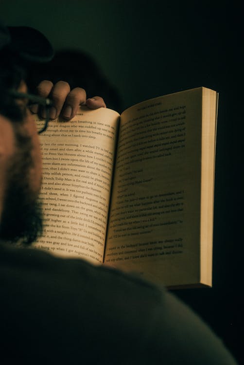 Man Reading A Book 