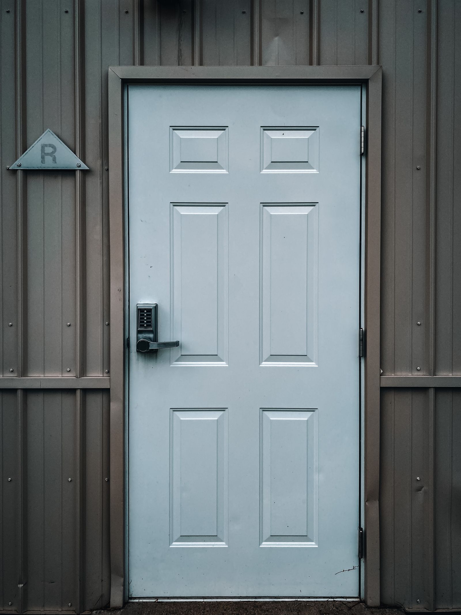 Exterior door with keypad lock for secure delivery destination