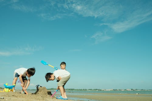 Children Playing on the Sand 