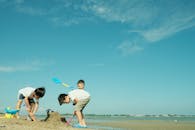 Children Playing on the Sand