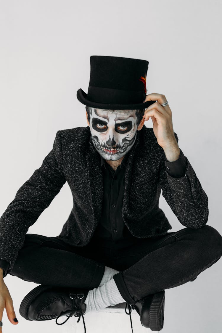 Man In Black Suit With A Scary Art Makeup